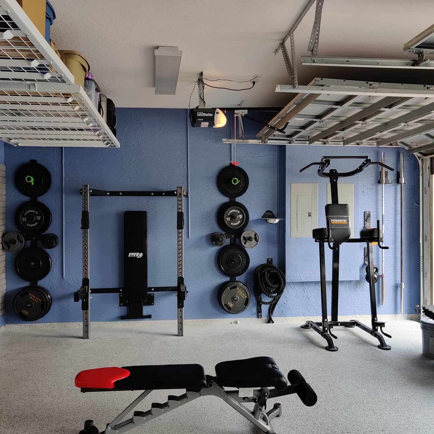 garage gym concrete floor heavy weights benchpress